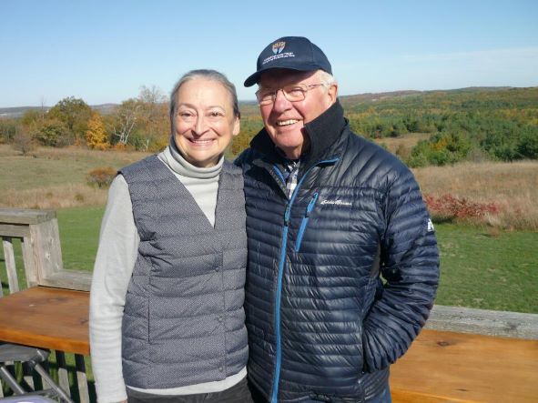 Ralph McKim and Jean Garsonnin on their porch at Ballyduff Trails