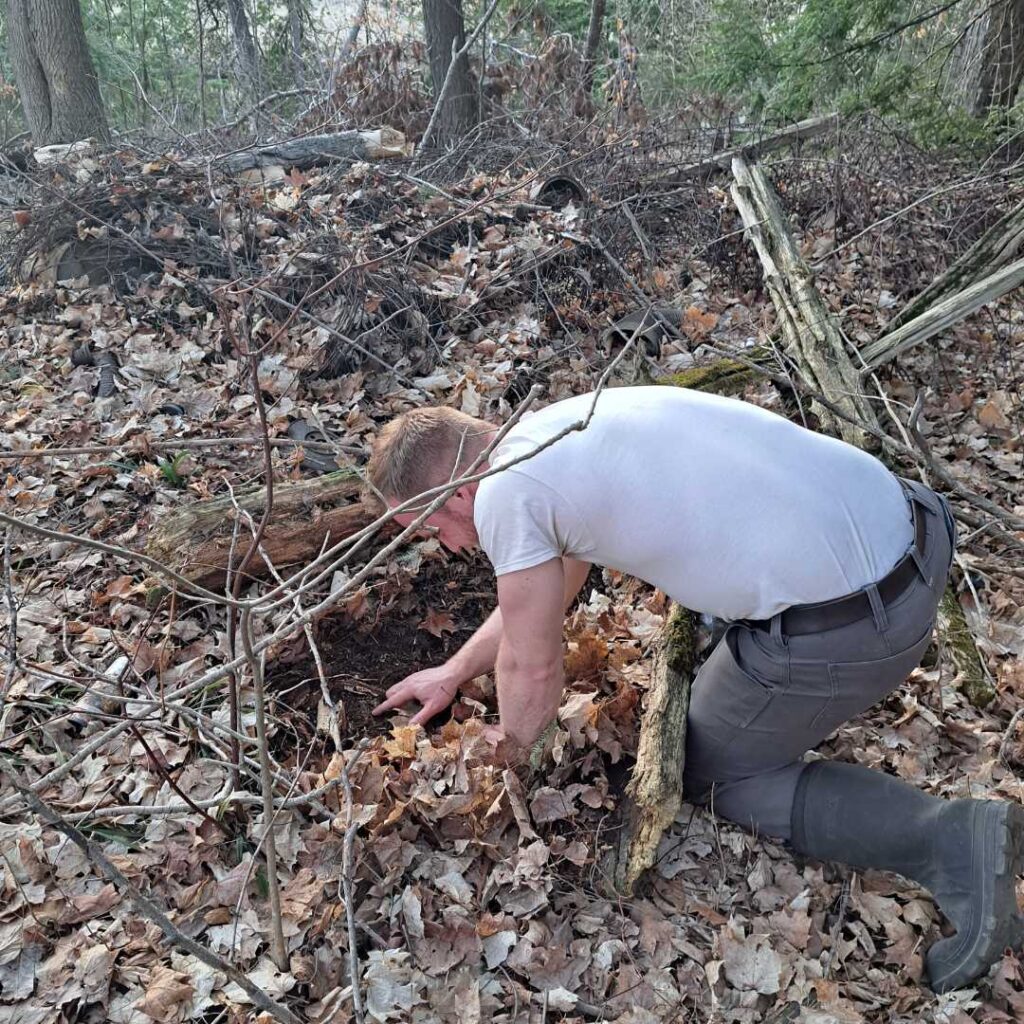 KLT volunteer looking for salamanders in Kawarthas