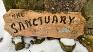 Paul Roussel's sign at Roussel-Steffler Memorial Sanctuary