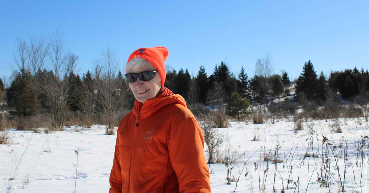 KLT volunteer Barb Rimmer in a KLT toque at Cation Wildlife Preserve near Coboconk in winter